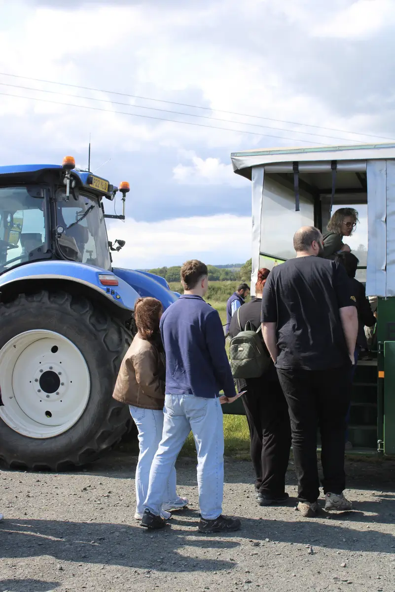 Grass to Grill tour guests Tour guests gathering beside the tractor and trailer