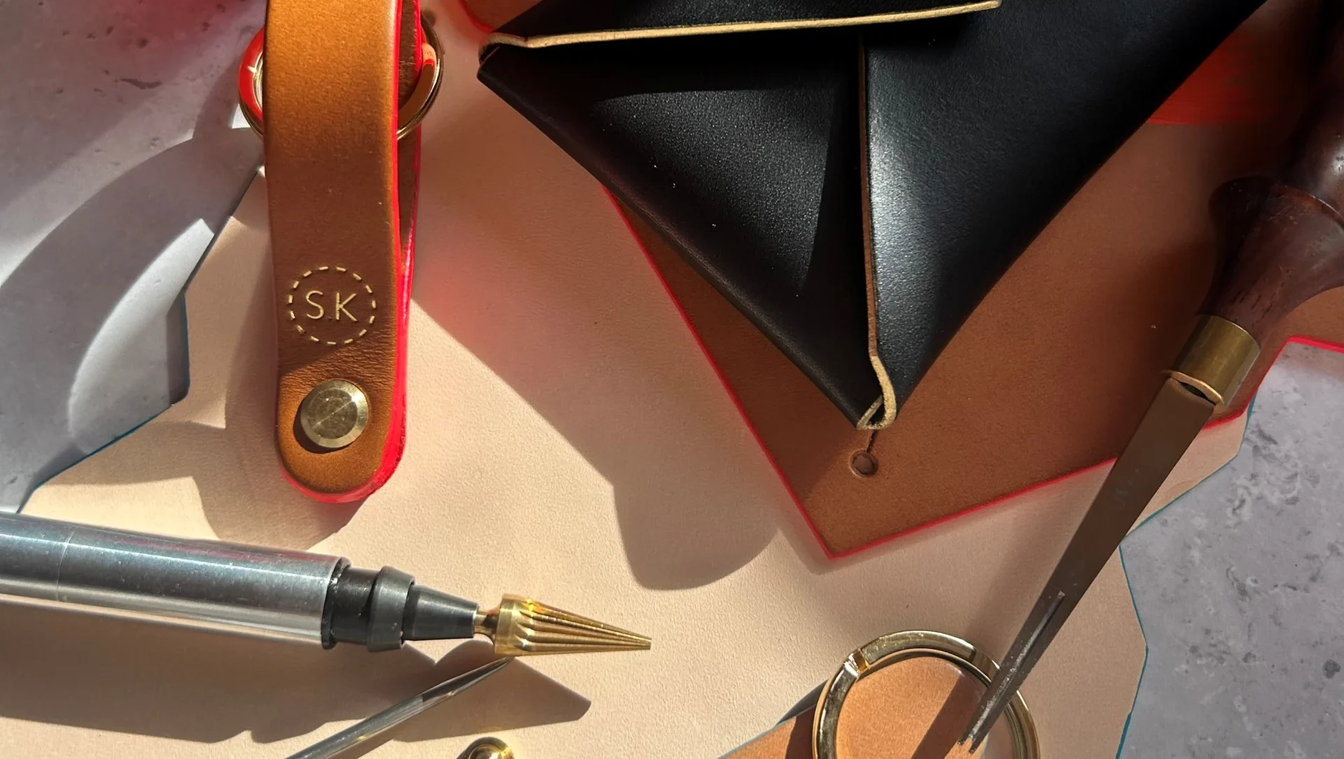 Handmade leather accessories Handmade leather pouch, key fob and leatherworking tools